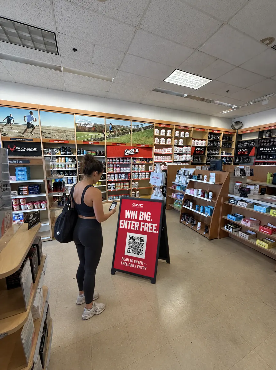 Bucked Up giveaway end cap inside GNC